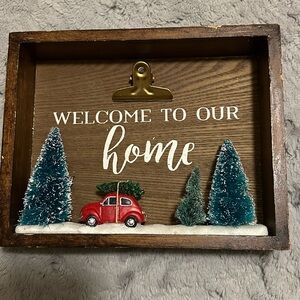 Charming Holiday Welcome Sign with Red Car and Green Trees